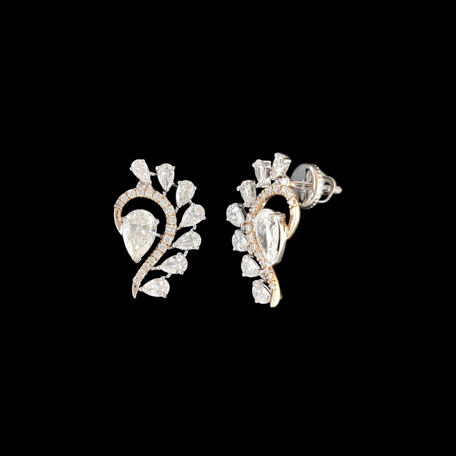 Pear Diamond Wave Swirl Stud Earrings in 14K Two-Tone Gold 1 Pear Diamond Wave Swirl Stud Earrings in 14K Two-Tone Gold